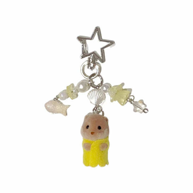 Sylvanian Families Handmade Keychain – Otter Baby in Lemon Yellow – Star & Seashell Beaded Charm